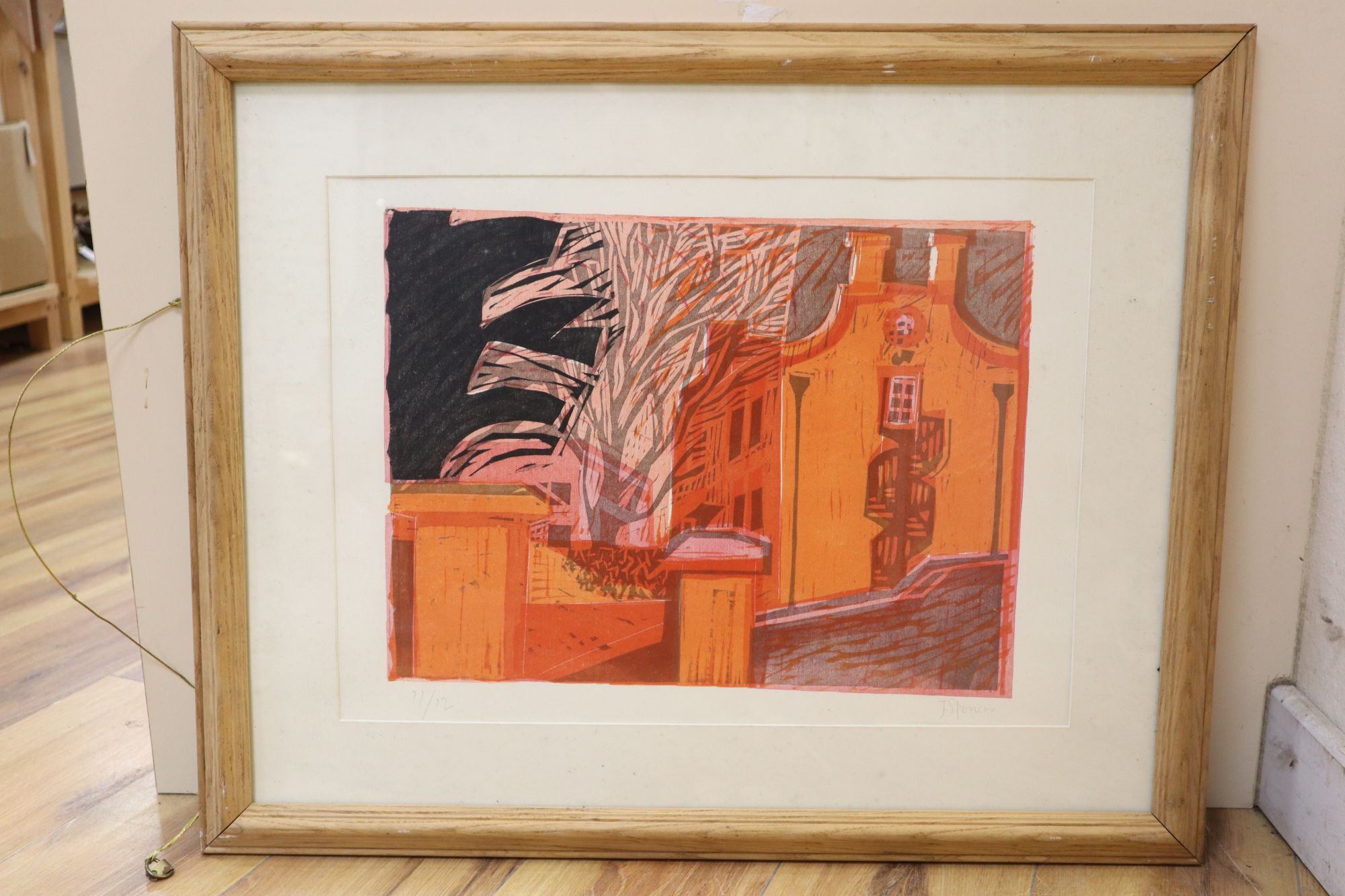 J. Spencer, linocut, View of terraced houses, signed and numbered 11/12, 35 x 48cm